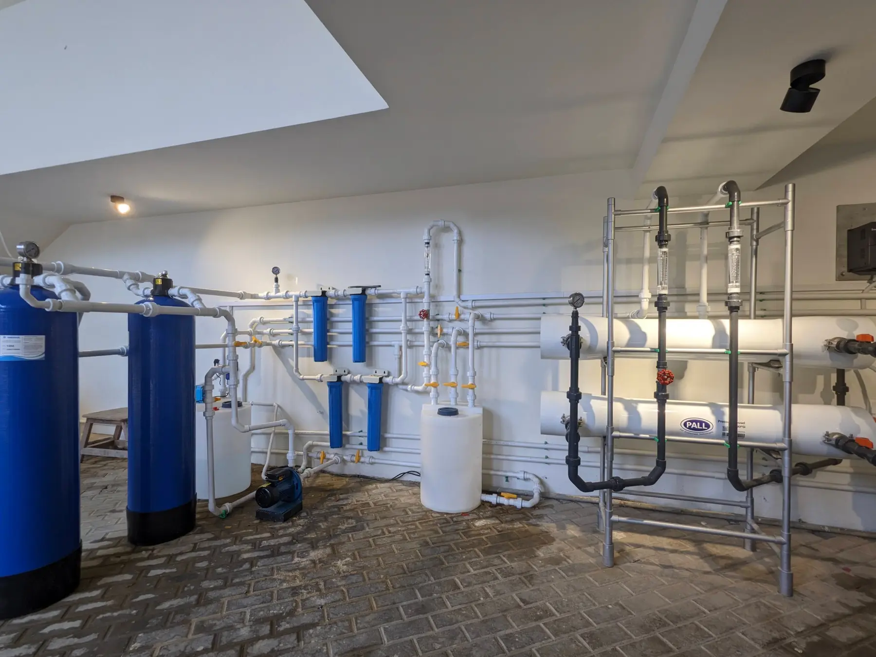 A SaT PaK RO plant room with media vessels, cartridge filters and RO frame